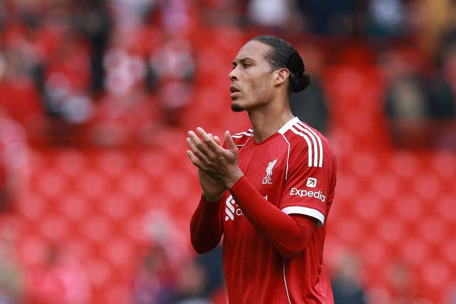 Liverpool's Virgil van Dijk applauds fans after the match Liverpool's Virgil van Dijk applauds fans after the match