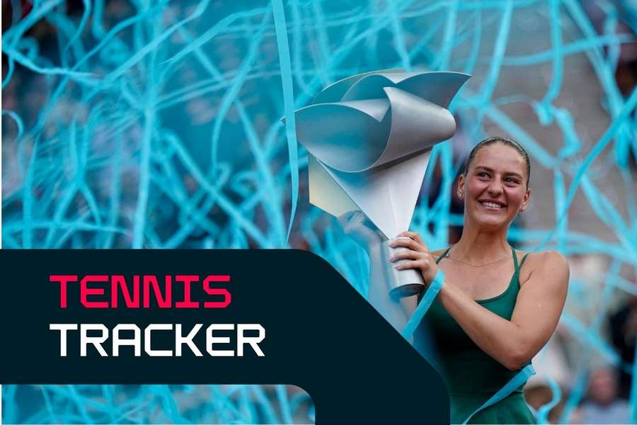 Marta Kostyuk lifts the trophy Marta Kostyuk lifts the trophy