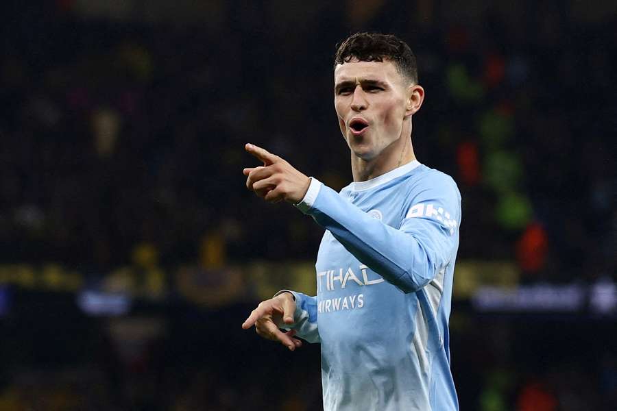 Foden celebrates his hat-trick Foden celebrates his hat-trick
