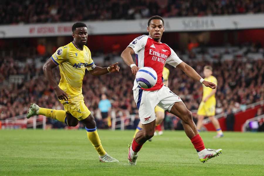 Crystal Palace’s Marc Guehi and Arsenal's Jurrien Timber challenge for the ball
