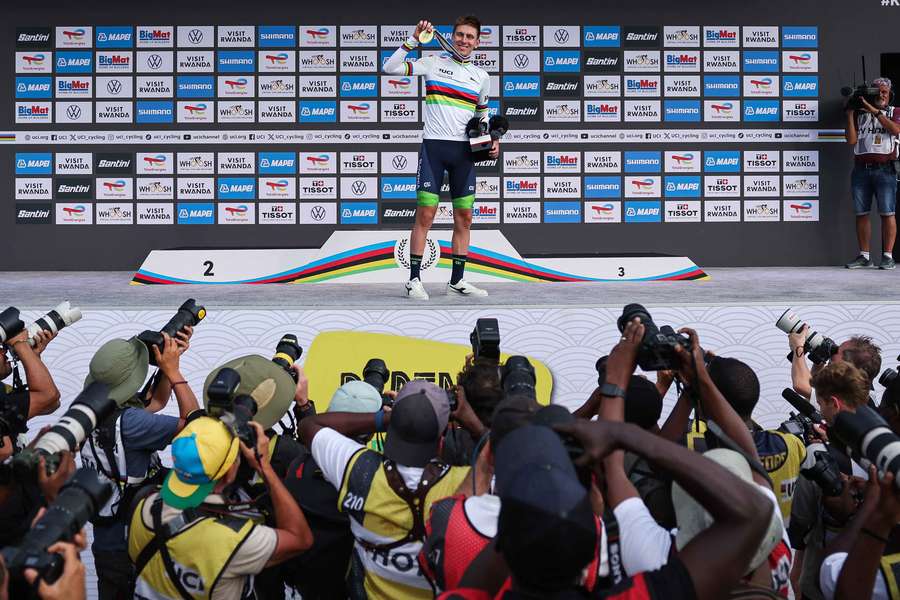 Gold medallist Slovenian rider Tadej Pogacar celebrates world title