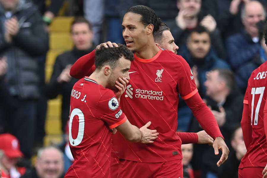 Virgil van Dijk celebrates after Diogo Jota scored a goal against Watford in August 2022