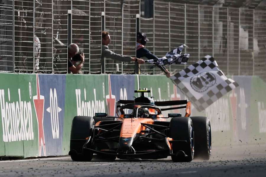 McLaren's Lando Norris crosses the finish line to win the Dutch Grand Prix