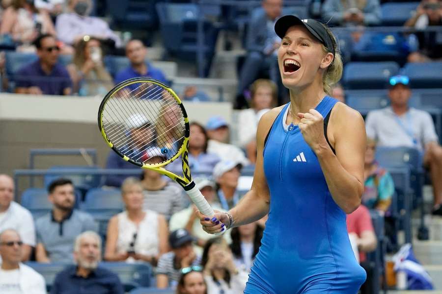 Wozniacki celebra a sua vitória diante de Jennifer Brady