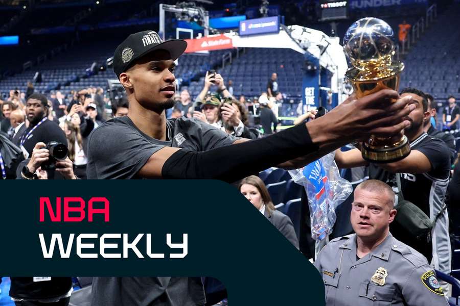 Wembanyama with his Western Conference Finals MVP trophy
