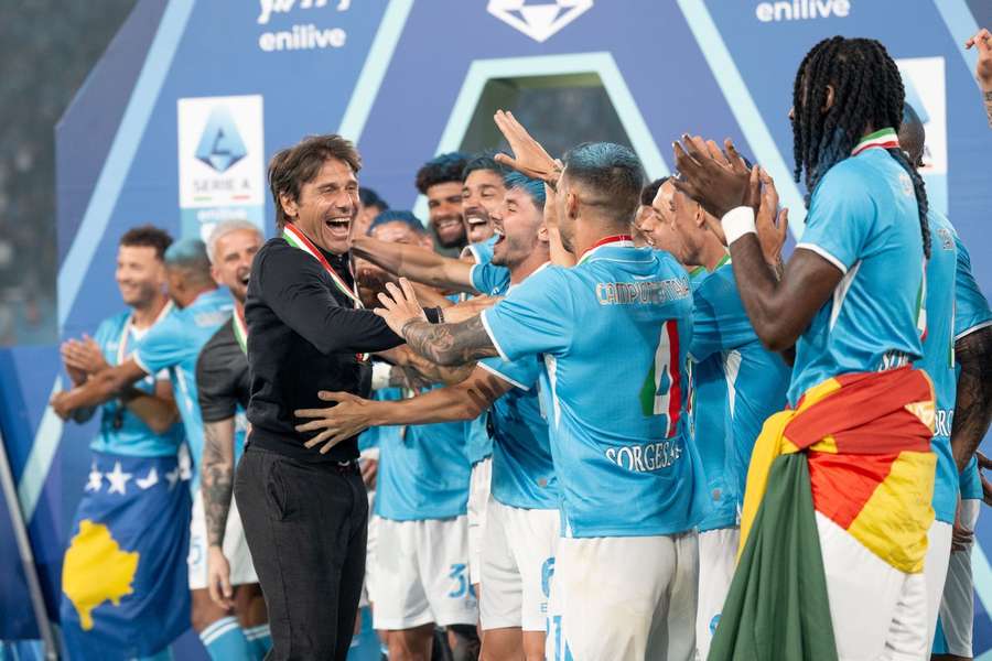 Conte thrilled to lead Napoli to title; offers hope on staying