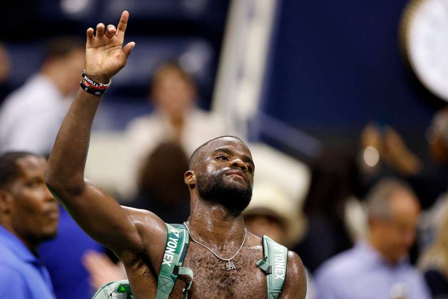 Tiafoe reacts after a disappointing loss