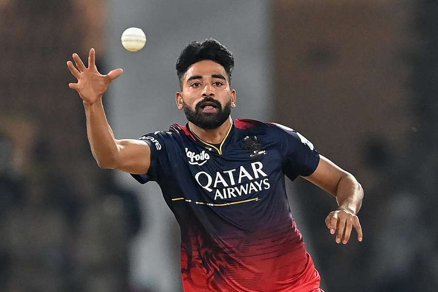 Mohammed Siraj fields the ball during the match between Lucknow Super Giants and Royal Challengers Bangalore