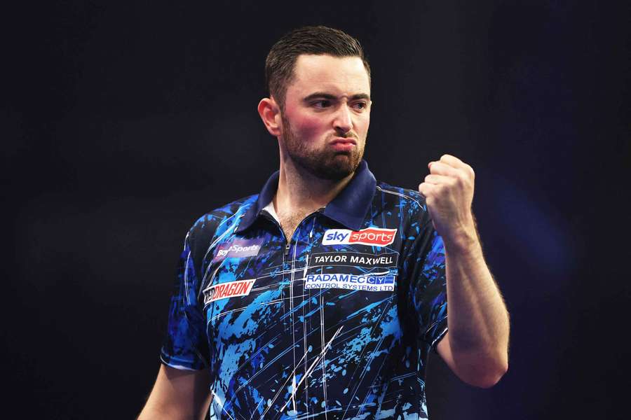 Luke Humphries celebrates during his semi-final match against Ryan Joyce