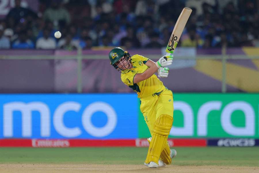 Alyssa Healy strikes a boundary against India at the 2025 ICC Women's World Cup. 