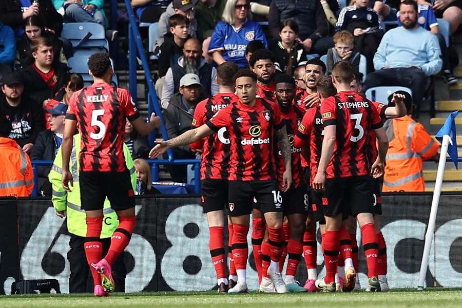 Bournemouth players celebrate after scoring their winner against Leicester