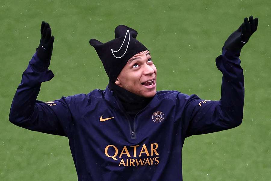 Paris Saint-Germain's French forward #07 Kylian Mbappe gestures during a training session