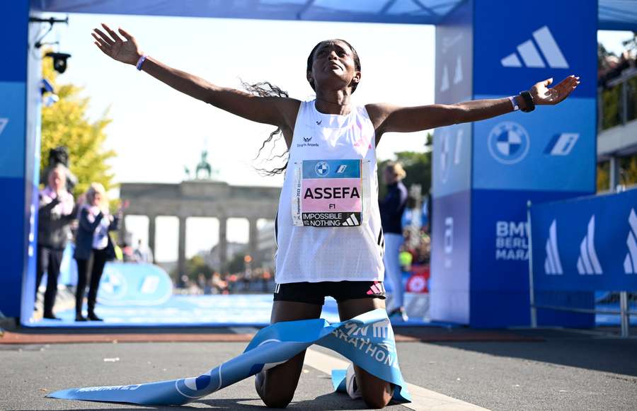 Ethiopia's Tigist Assefa celebrates after smashing the women's marathon world record
