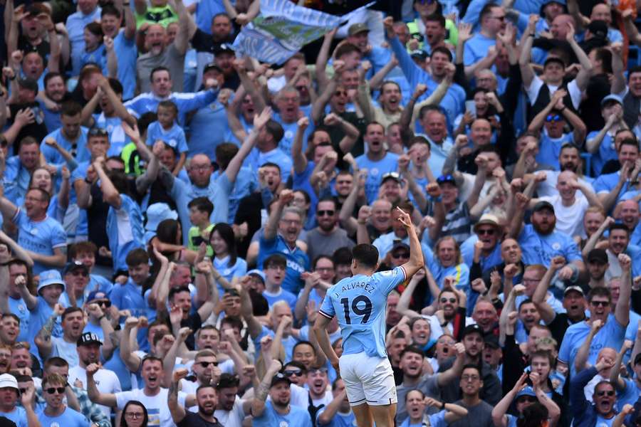 Manchester City's Argentinian striker Julian Alvarez celebrates scoring the opening goal during the English Premier League football match between Manchester City and Chelsea