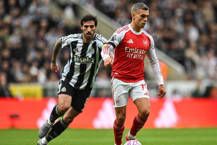 Arsenal's Leandro Trossard shields the ball from Newcastle's Sandro Tonali