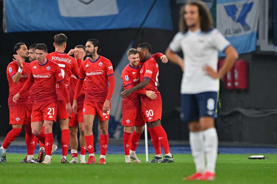 Fiorentina's players celebrate goal