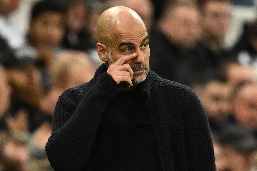 Pep Guardiola reacts during Man City's defeat at Newcastle