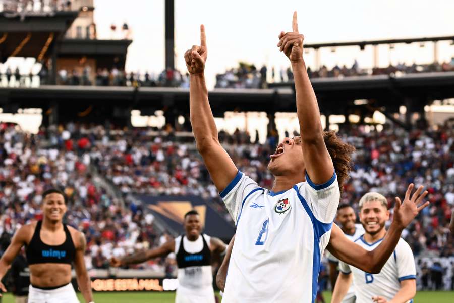 Panama's midfielder Adalberto Carrasquilla celebrates after scoring the winning penalty