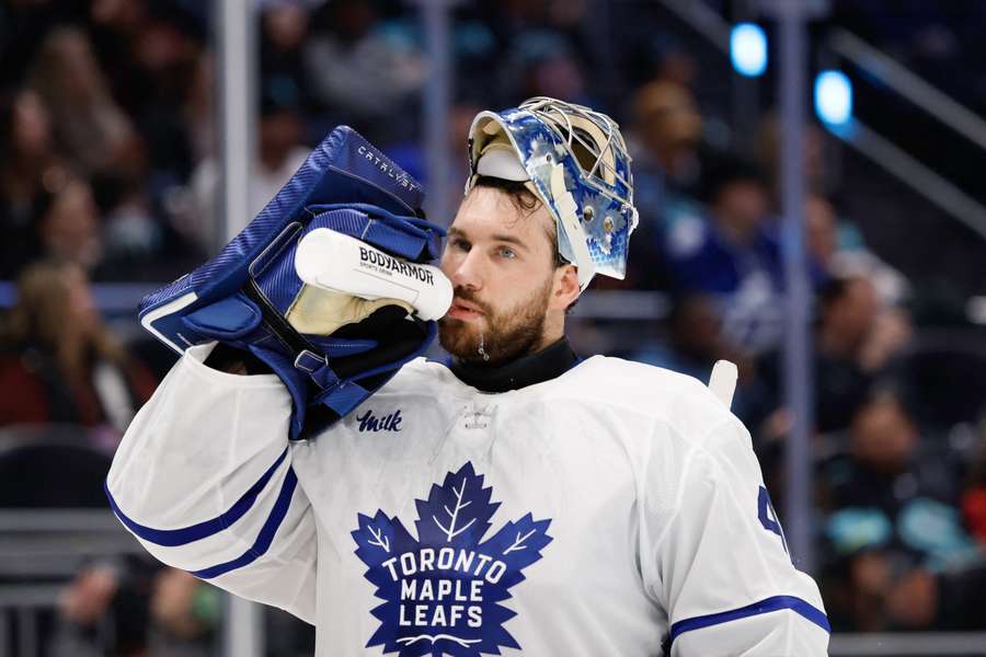 Maple Leafs goalie Anthony Stolarz takes a water break during a game