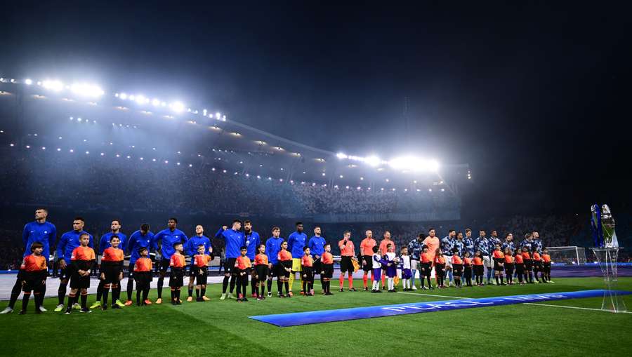 The players line-up ahead of kick-off