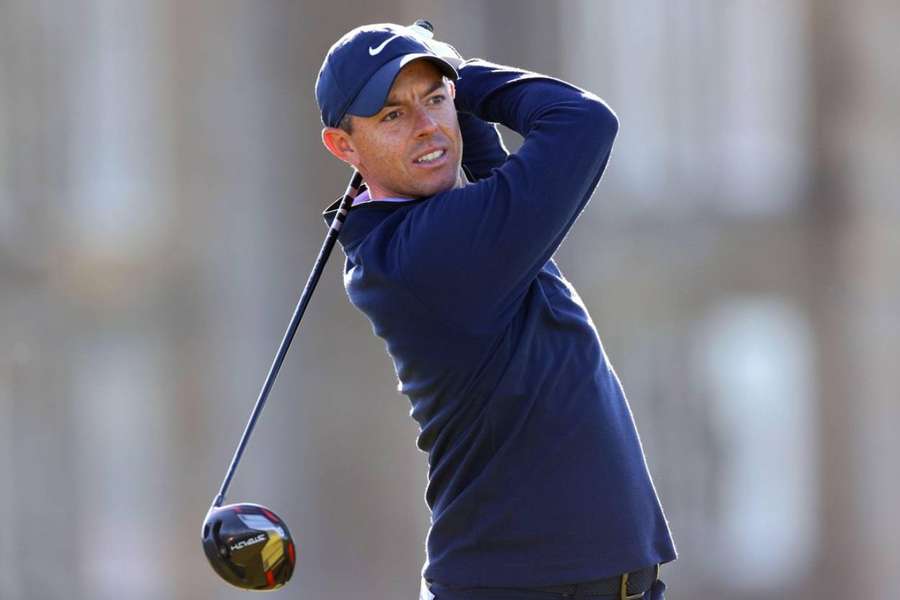 McIlroy plays down storm after Reed throws tee during practice session