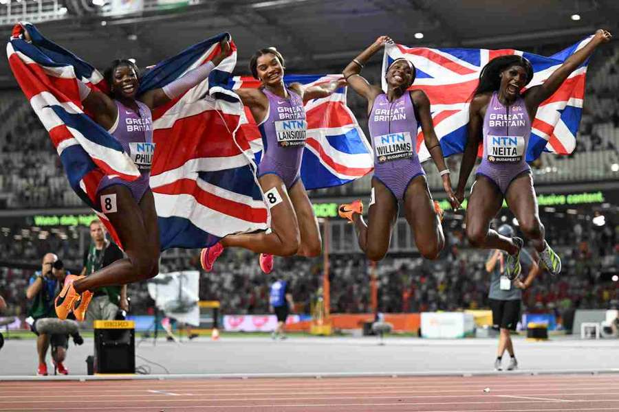 Asha Philip, Imani Lansiquot, Bianca Williams and Daryll Neita jump in the air as they celebrate winning bronze in the women's 4x100m relay final yesterday