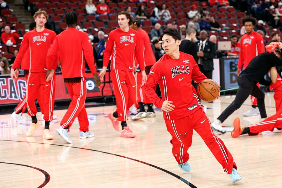Chicago Bulls warm up for a home game in the United Center 