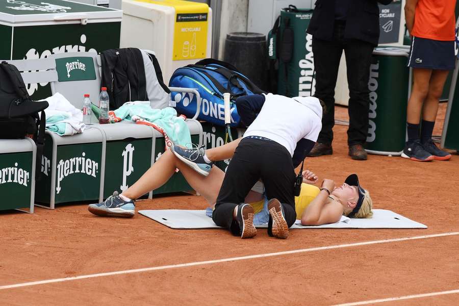 Clara Tauson receiving treatment during the French Open