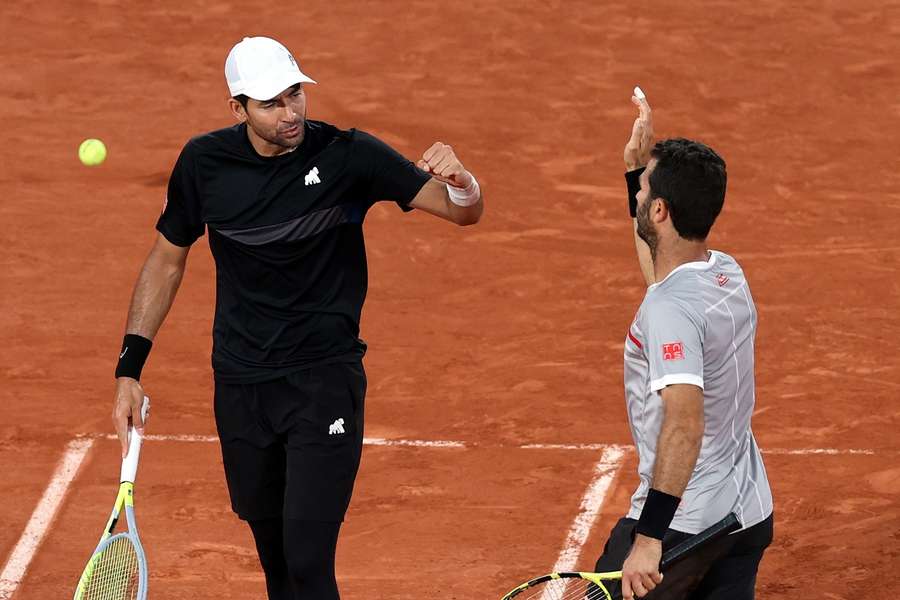 Jean-Julien Rojer met zijn dubbelpartner Marcelo Arévalo