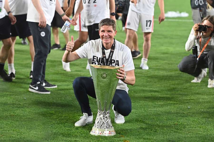 Oliver Glasner celebrates with the Europa League trophy