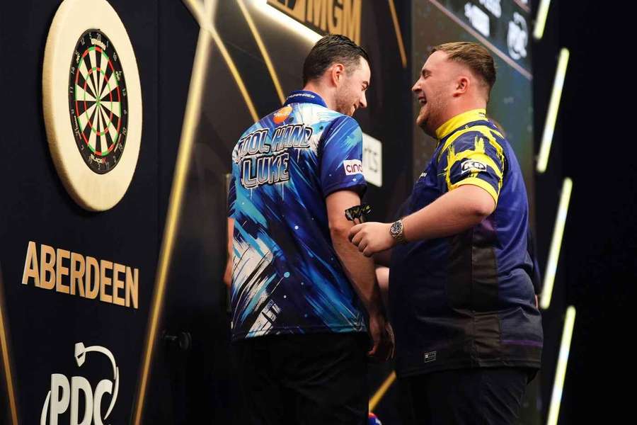 Littler (right) shakes hands with Humphries