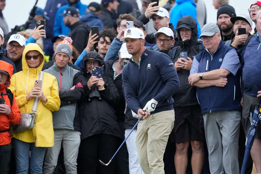 Bryson DeChambeau bites back after horror start at Troon