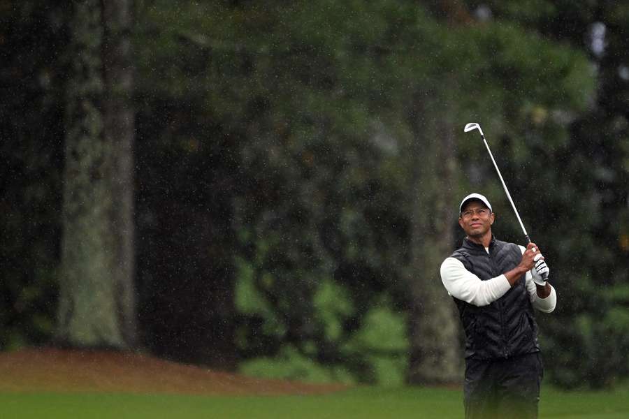 Tiger Woods of the United States plays a shot