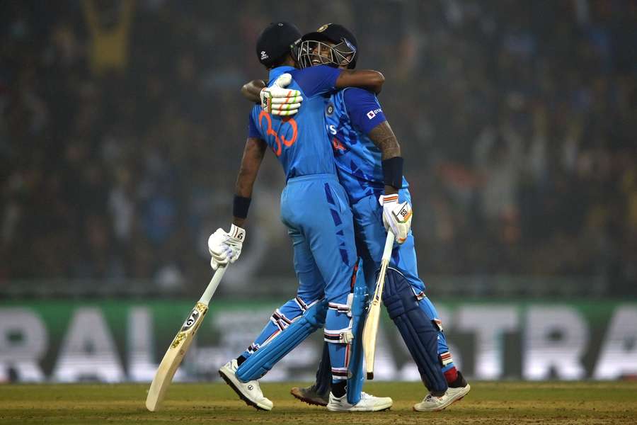 India's captain Hardik Pandya and his teammate Suryakumar Yadav celebrate their win