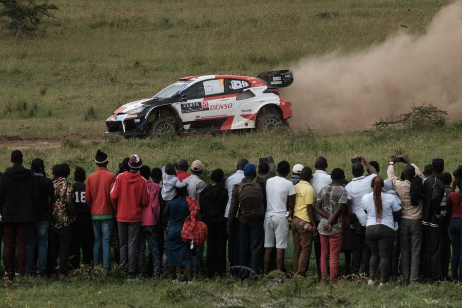 Fans watch on as Ogier races through the track