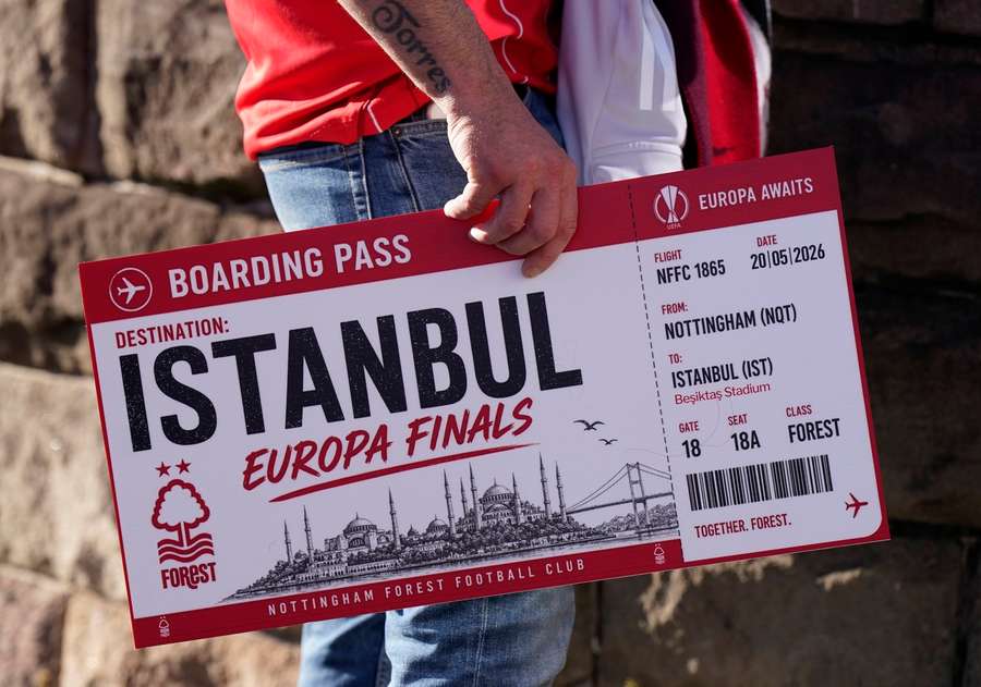 A confident Nottingham Forest fan holds a fake boarding pass ahead of their match with Aston Villa