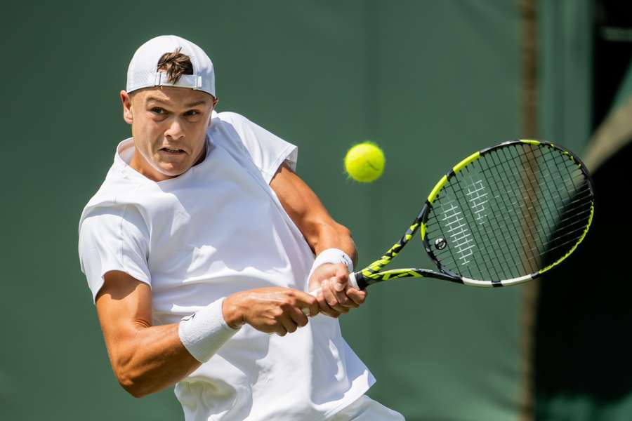 Holger Rune in action during Wimbledon