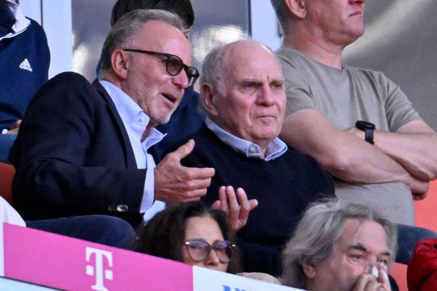 Karl Heinz Rummenigge and Uli Hoeness eagerly discussing matters at the Allianz Stadium