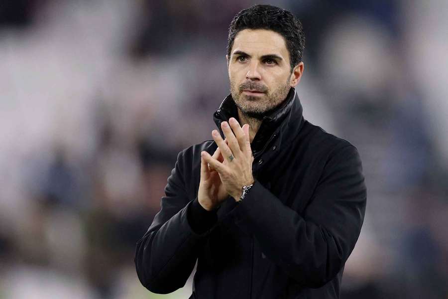 Mikel Arteta claps Arsenal's fans after the win