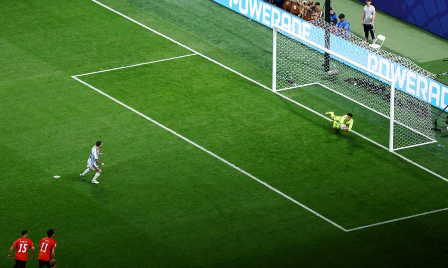 Egypt's Mostafa Shoubir in action as he saves a penalty kick from Argentina's Lionel Messi