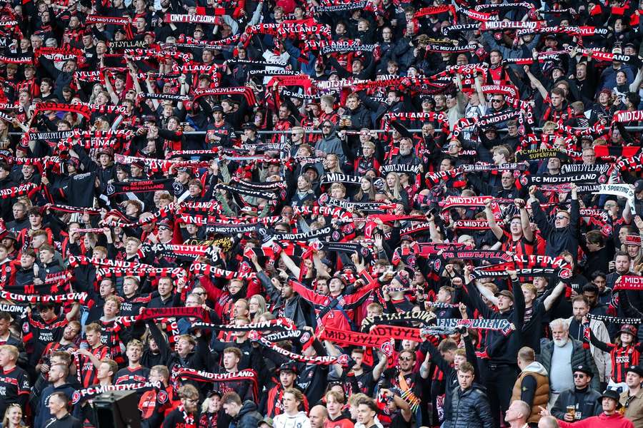 FC Midtjylland fans celebrate the had-fought win in Haderslev FC Midtjylland fans celebrate the had-fought win in Haderslev