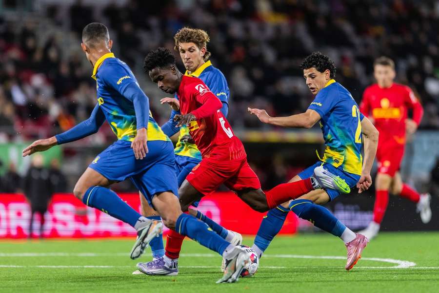 FC Nordsjaellland's Prince Junior challenging three Brondby-defenders