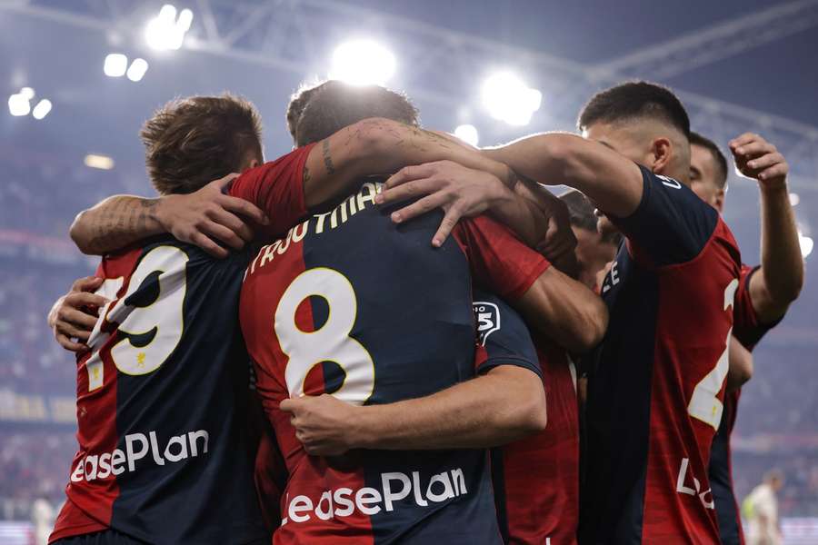 Genoa celebrate their opening goal