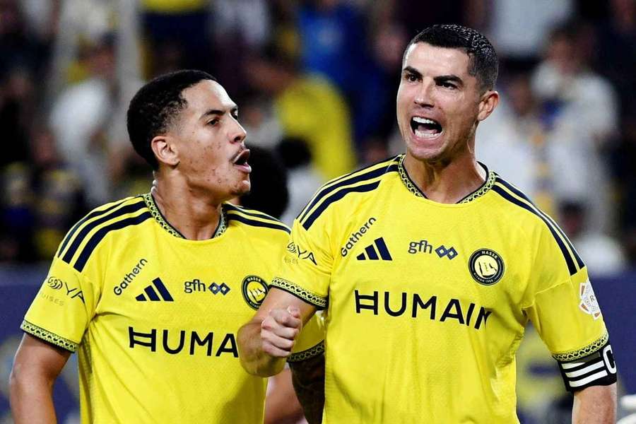 Al Nassr's Cristiano Ronaldo celebrates scoring their third goal with Angelo Al Nassr's Cristiano Ronaldo celebrates scoring their third goal with Angelo