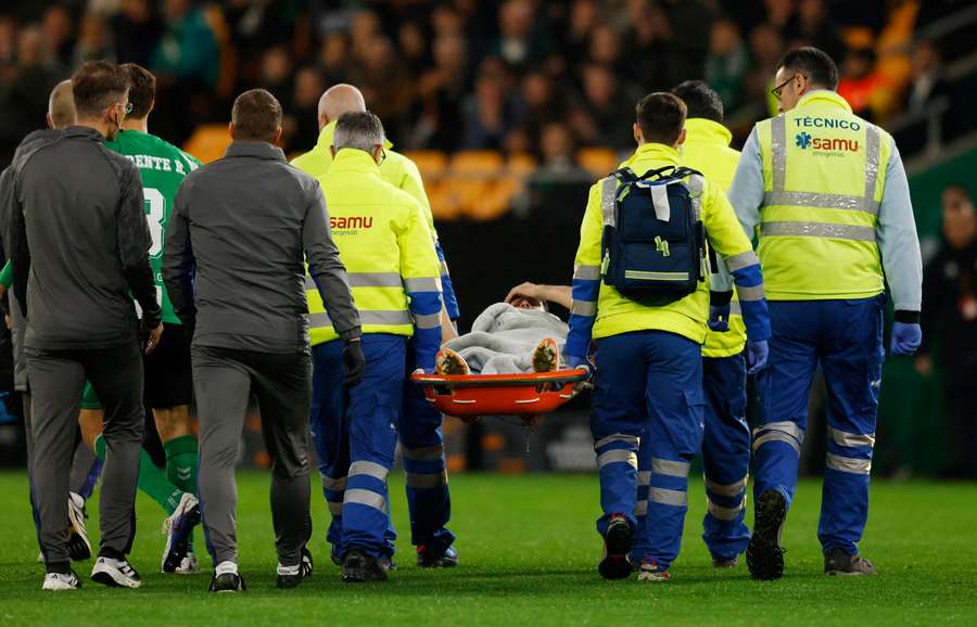 Feyenoord's Shaqueel van Persie leaves the pitch on a stretcher after suffering a knee injury Feyenoord's Shaqueel van Persie leaves the pitch on a stretcher after suffering a knee injury