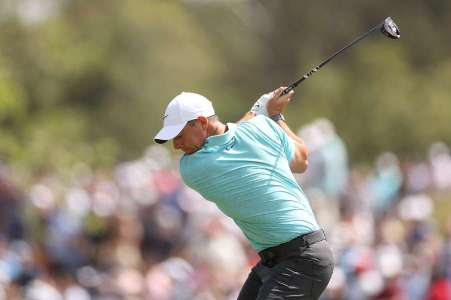 Rory McIlroy of Northern Ireland plays his shot from the third tee during the final round