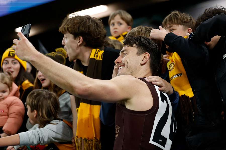 After a few weeks of misery, they're a happy team at Hawthorn again.