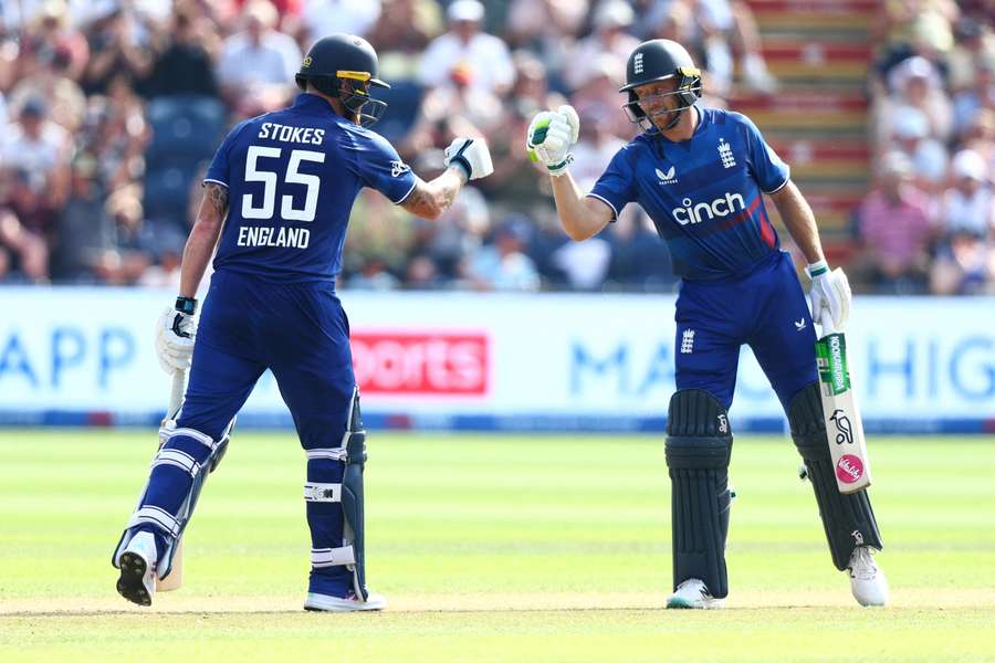 Jos Buttler and Ben Stokes touch gloves during England's ODI against New Zealand last year