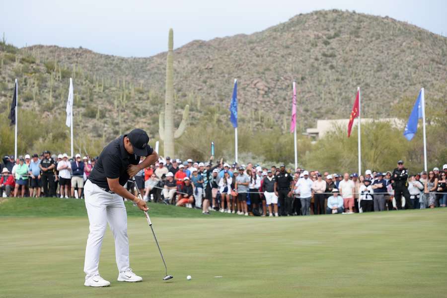 Danny Lee putts on the second play-off hole