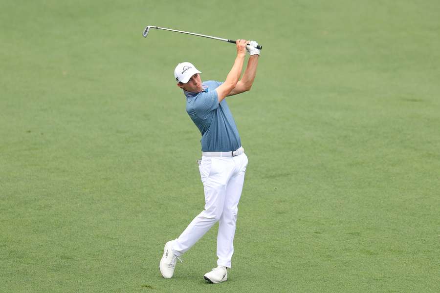 Matt Fitzpatrick of England plays a shot on the ninth hole during a practice round 